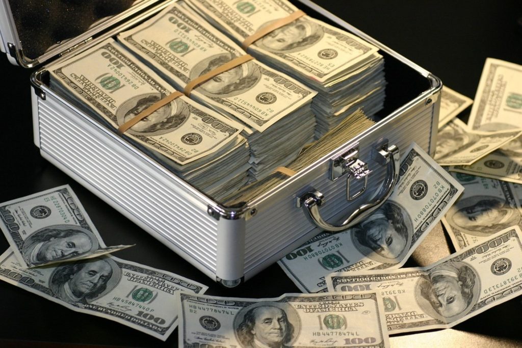 US Dollars were put in a box - Joy of Life® Surrogacy