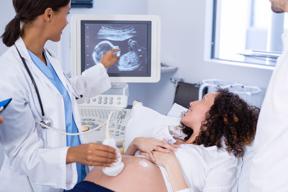 Surrogate mother getting ultrasound
