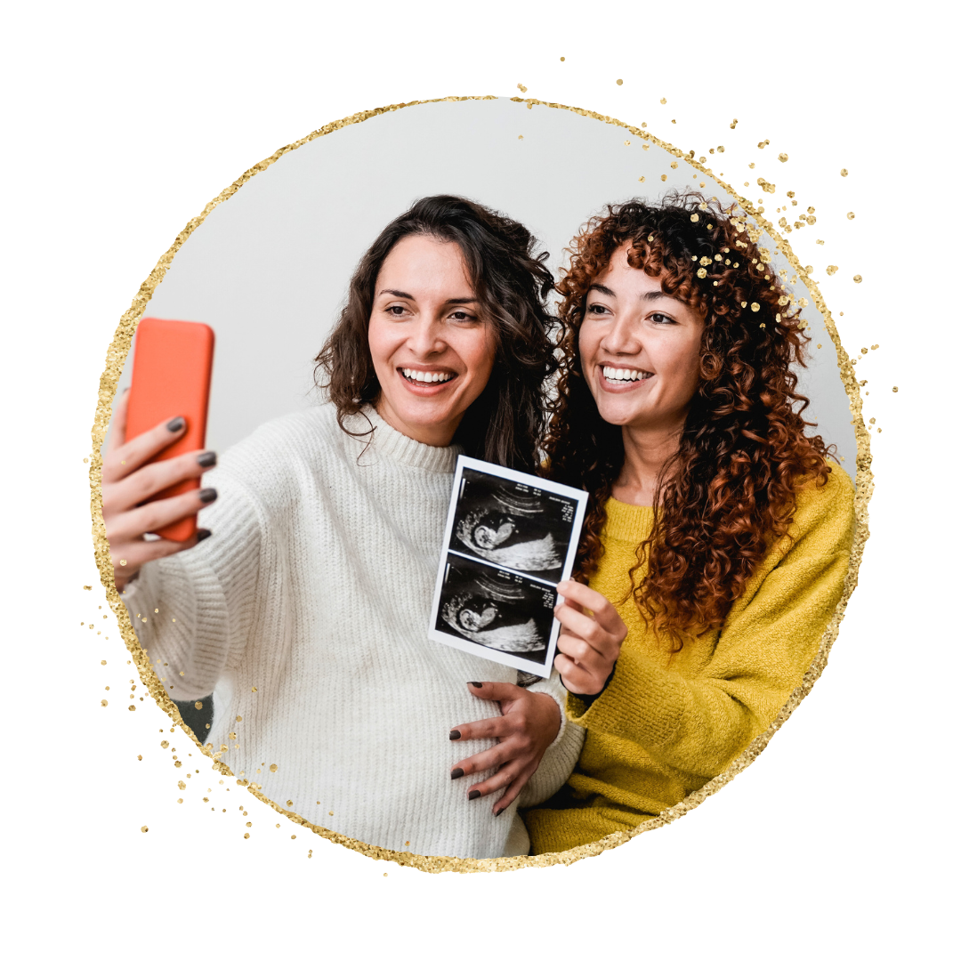 Intended parents sharing the excitement about their surrogate pregnancy