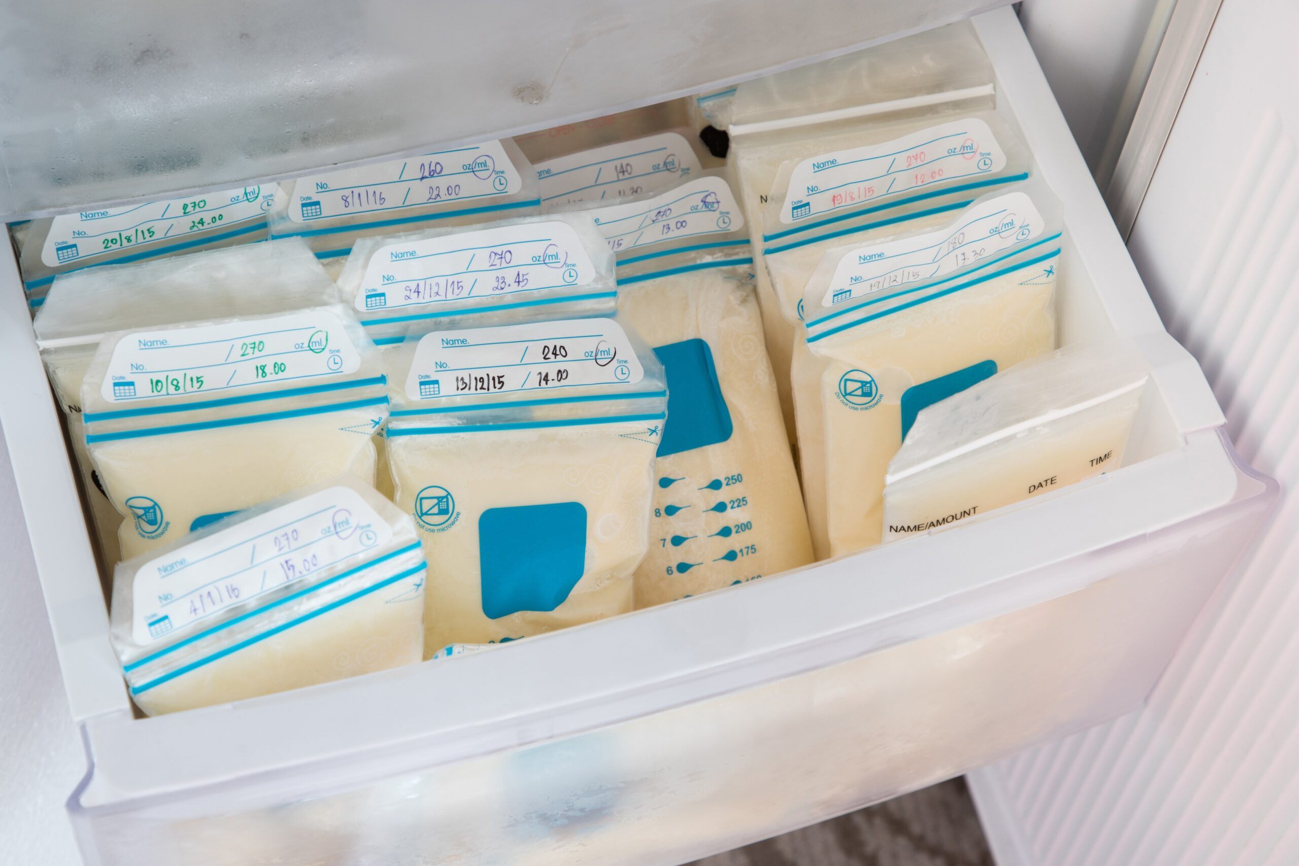 Bags of Frozen Breast Milk in a Freezer Drawer