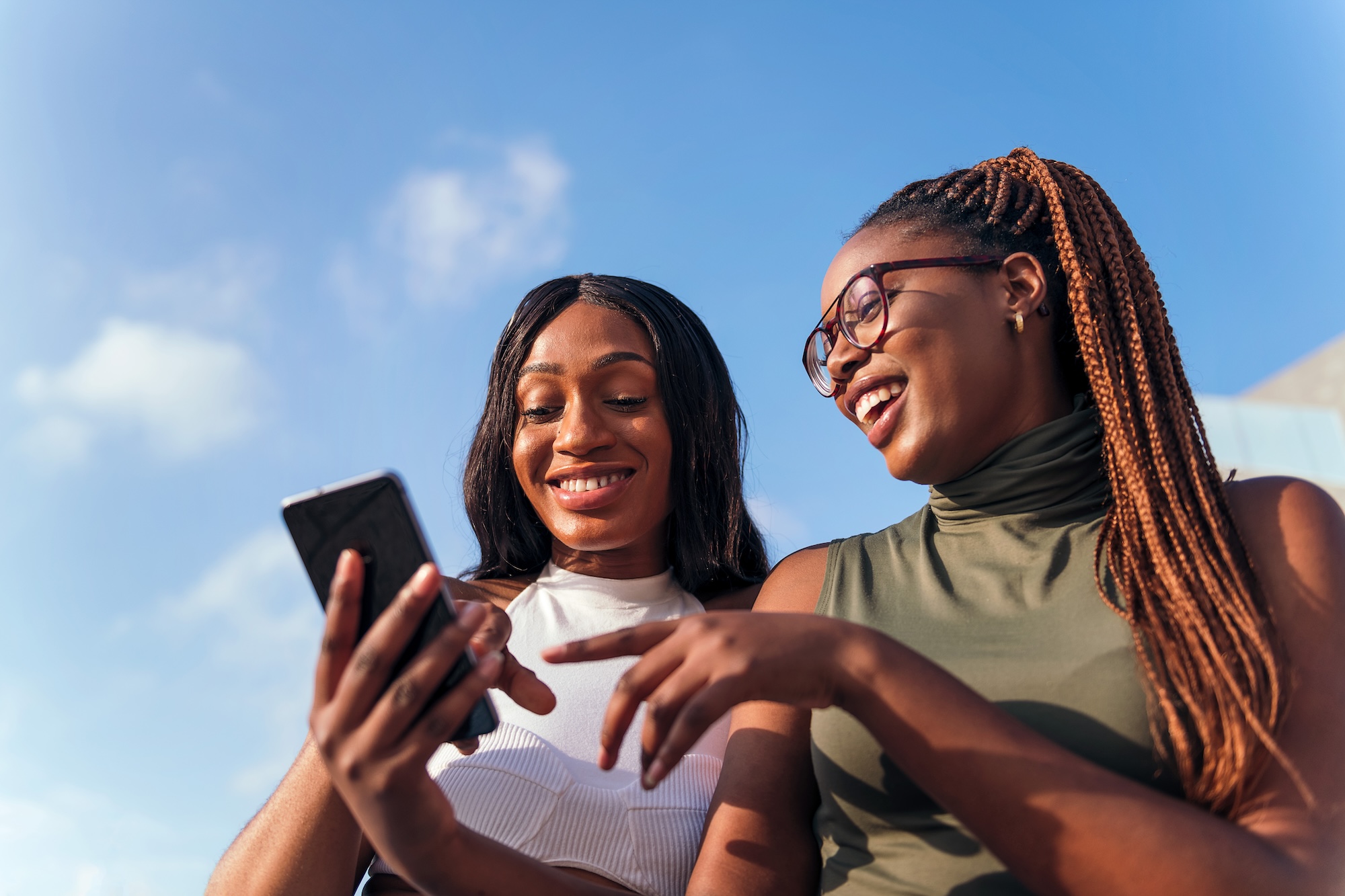 Two women talking and smiling